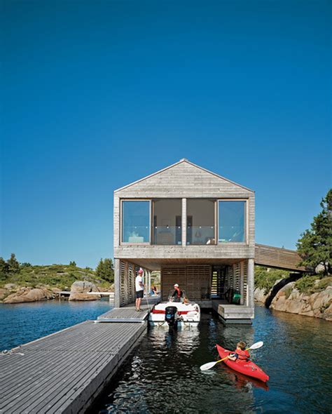Integrated Dock And House Of Boat With Two Level Floating Home Design