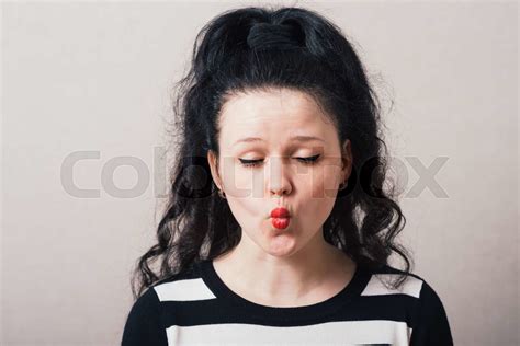 Girl Showing A Kiss Stock Image Colourbox