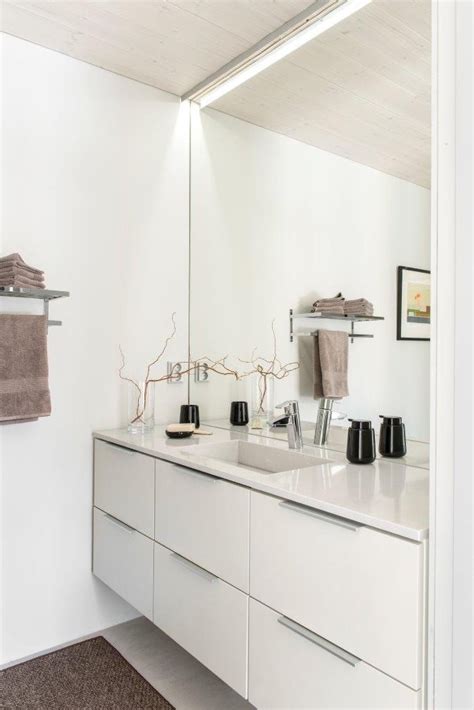 Finnish Wood House With Silestone® Bathroom And Dekton® Kitchen Com