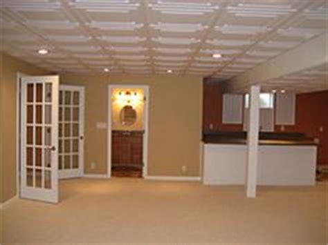 Take your basement drop ceiling from drab to fab by swapping out those old 2' x 4' panels for fresh 2' x 2's. 1000+ images about Basement Ceilings on Pinterest ...