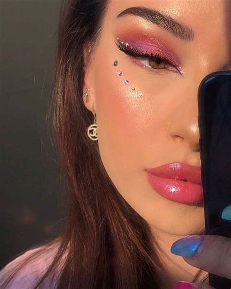 fit pics and more 🧚🏼‍♀️ on instagram “euphoria vibes” rhinestone makeup pink makeup pink eye