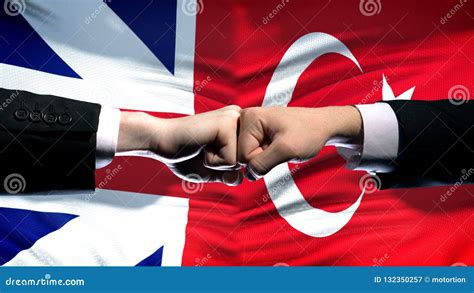 Great Britain Vs Turkey Conflict Fists On Flag Background Diplomatic