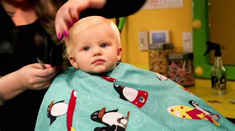The best time for a baby's first haircut is when the child is sitting comfortably. Baby's First Haircut - YouTube