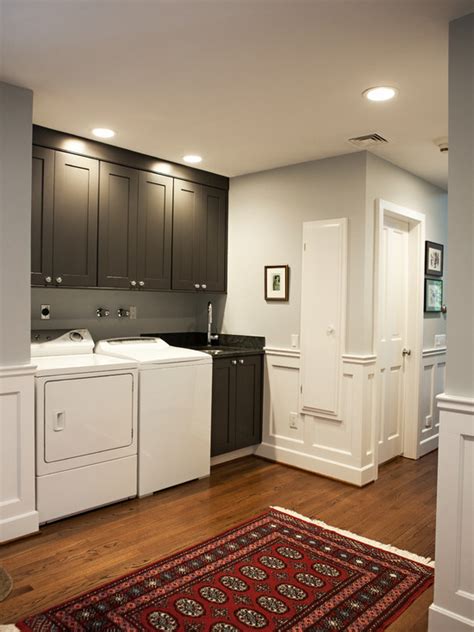 Between her primary bedroom and her bathroom. Gray Laundry Room Cabinets - Traditional - laundry room ...