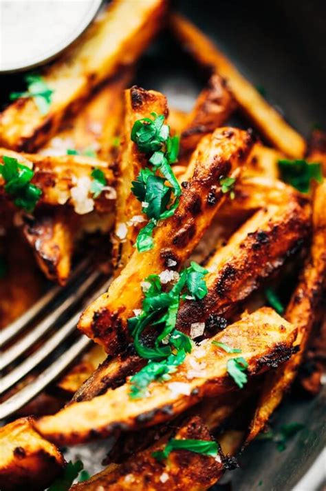 Sweet potato fries that are tender, not dry nor hollow, and so very crispy. Extra Crispy Garlic Lime Sweet Potato Fries - Paleo Gluten Free Eats