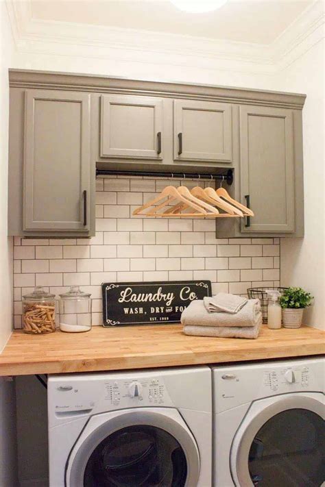 This laundry room features the white country 30″ farmhouse sink from american standard. 30+ Unbelievably inspiring farmhouse style laundry room ideas