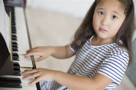 518 Little Girl Learning To Play Piano Stock Photos Free And Royalty