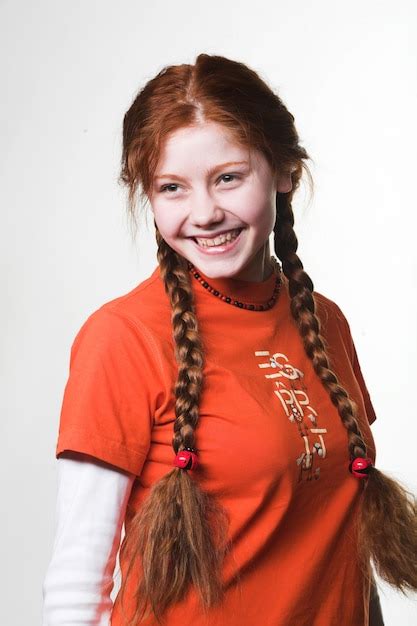 premium photo picture of lovely redhead girl with long braids