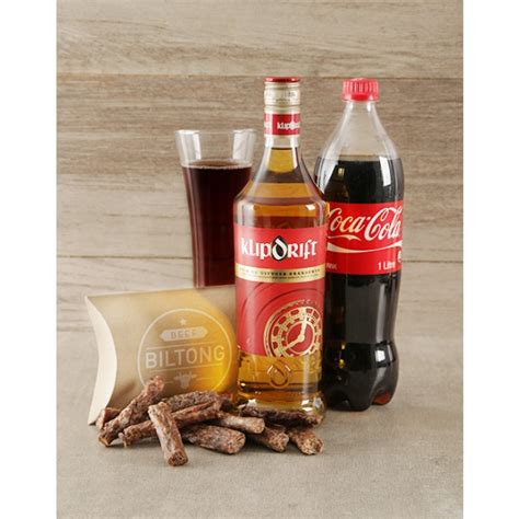 My boyfriend is turning 21 in less than two weeks and i'm still stumped about what to get him. Klippies Coke & Biltong Hamper | Klipdrift Brandy, Coke ...