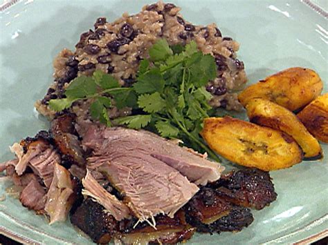 It is typically made with fried green very tasty puerto rican rice and beans recipe. Puerto Rican-Style Roasted Pork Shoulder with Rice and ...