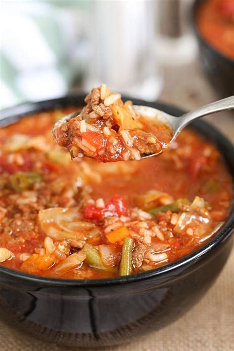 Add cabbage pieces to the top and push down gently into soup mixture. Slow Cooker Cabbage Roll Soup - PolyTrendy | Soup recipes ...