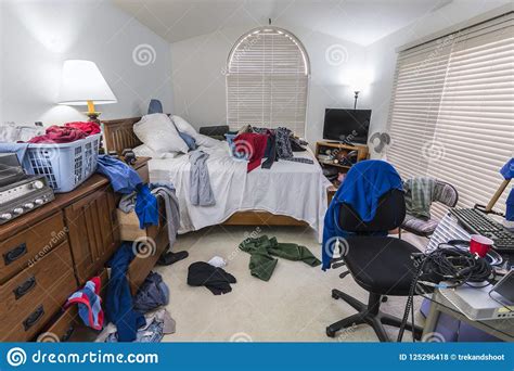 If you are typically neat and organized, suddenly not caring about a messy room might be a sign that something is going on in your life. Messy Teenage Boys Bedroom stock photo. Image of apartment ...
