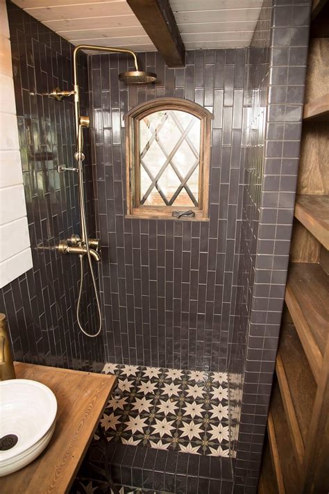 Ap design house optimized this bathroom by installing a narrow shelf over the sink for storing small essentials like skincare products, cotton swabs, and more. TINY HOUSE TOWN: Old World Vermont Tiny Home (300 Sq Ft)