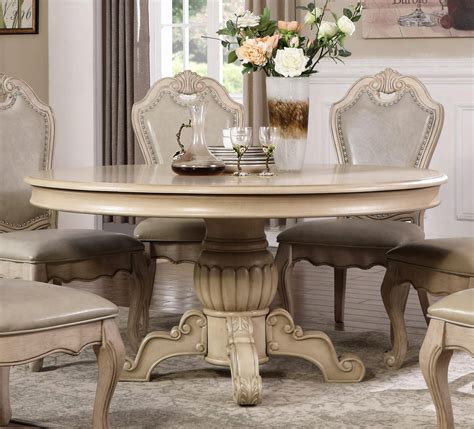 Infused with a transitional style, this rustic dining table set is sure to add a luxury feel to your home. McFerran D3501-6060 Traditional Antique White Finish Round ...