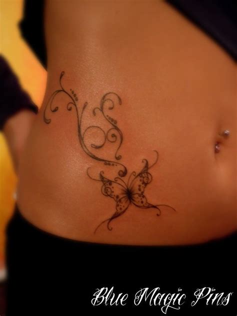 Butterfly Tattoo On Lower Stomach