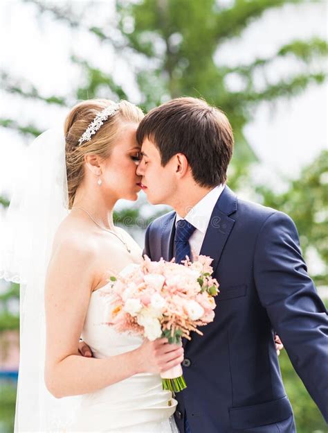 Wedding Beautiful Romantic Bride And Groom Kissing Stock Image Image Of Emotion Couple 68216713