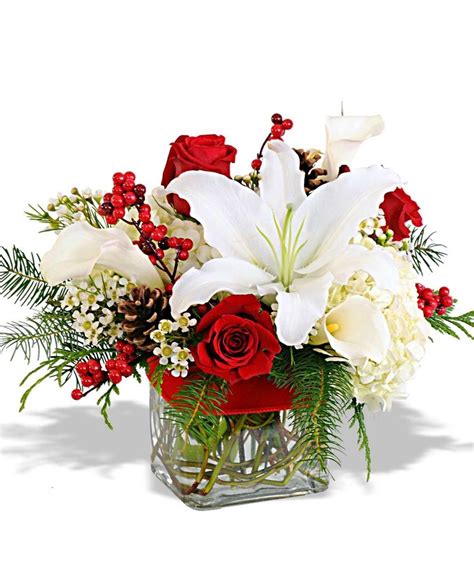 We're family owned and operated,. Holiday Centerpiece | Christmas flower arrangements ...