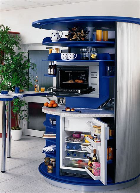 The circle kitchen is designed and created by the german company compact concepts, and it on the lower half the circle kitchen is a dishwasher, small refrigerator, and tons of storage space. Revolving Circle Compact Kitchen ~ Home Design