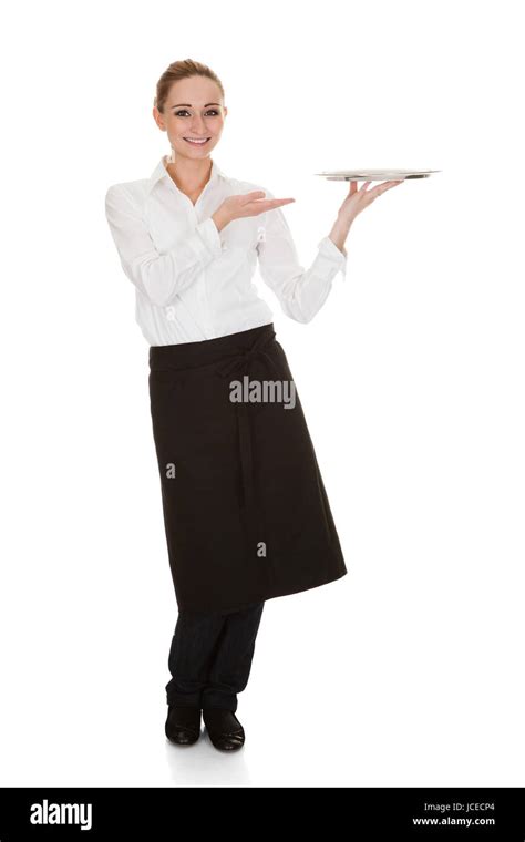 Happy Young Waitress Holding Tray Over White Background Stock Photo Alamy
