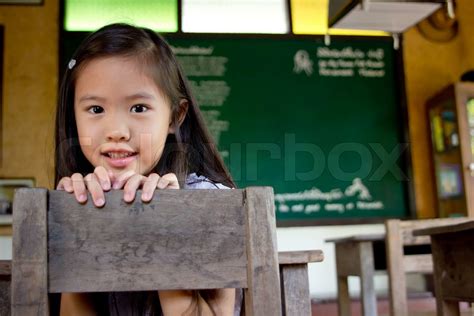 Smiley Asian Girl In The Classroom Stock Image Colourbox