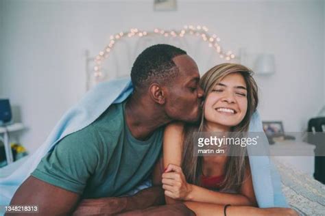 Black Couple Kissing Bed Stock Fotos Und Bilder Getty Images