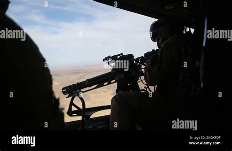 Us Marine Door Gunner Firing Machine Gun From Helicopter Stock Video