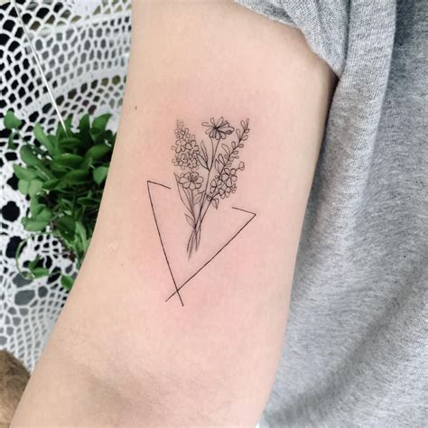 Childs Birthmark Flower Bouquet Tattoo Inked On The Right Upper Arm
