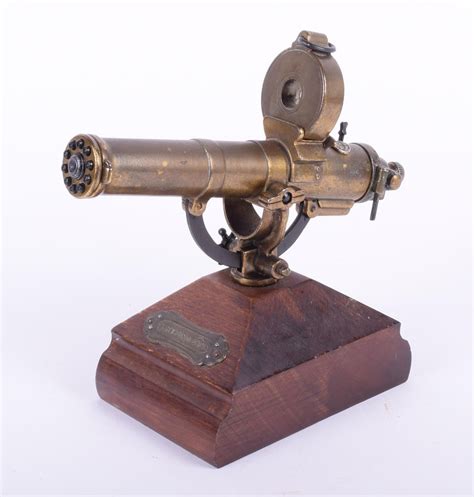 A Brass Model Gatling Gun With Moving Parts Including A Crank Wind