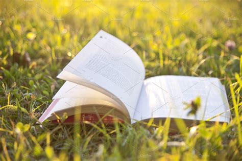 Voice commands on the #openbook with #tensorflowlite. Open book on grass ~ Arts & Entertainment Photos ~ Creative Market