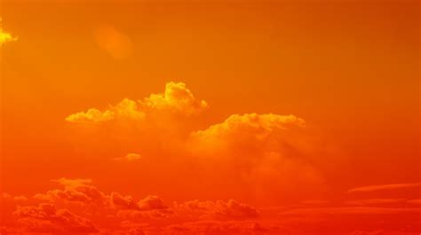 Premium Photo Orange Sky Clouds Moving Away Rolling Colorful Sunset