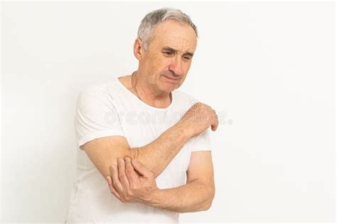 An Elderly Man Hurts His Elbow Stock Image Image Of Hurt Muscle