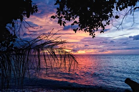 Sunset On Wonderful Turquoise Tropical Paradise Background Stock Photo