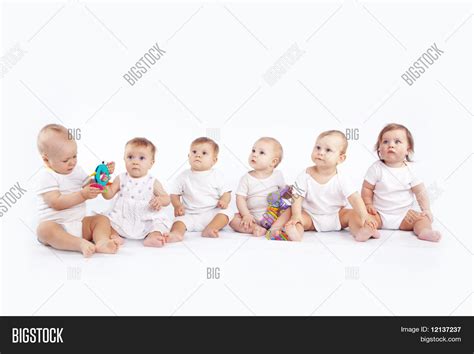 Group Babies Sitting On White Image And Photo Bigstock