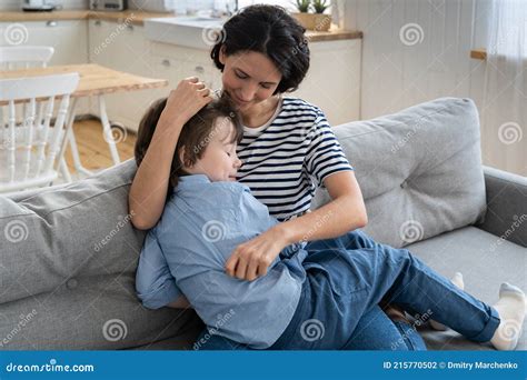 Happy Mother Hug Son Sleep On Knees Cute Caucasian Mom And Preschool