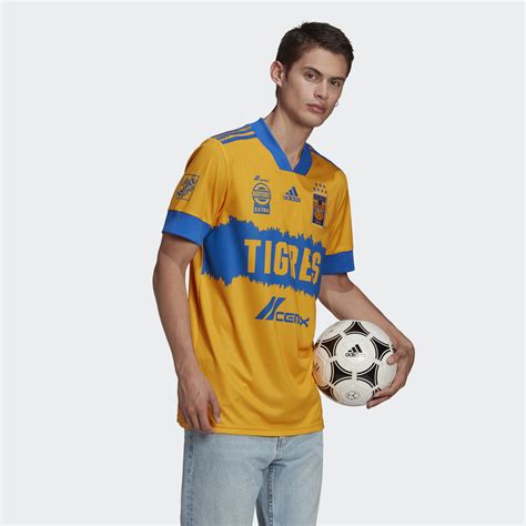 Is a mexican professional football club based in the city of puebla, competing in the liga mx.the team shirt features a diagonal stripe (traditionally blue on white on the home kit, and a combination of different colors on the away kits) that crosses the chest diagonally from right to left, which is considered a distinctive element of its identity. Tigres 2020-21 Adidas Home Kit | 20/21 Kits | Football ...