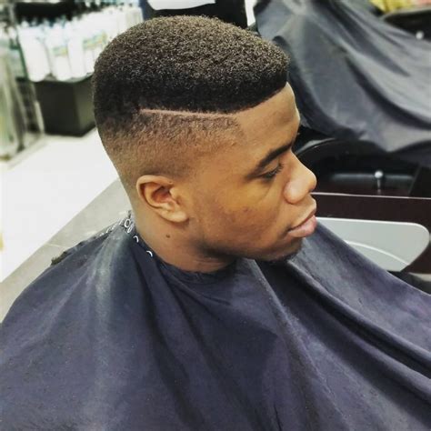 Top knot haircut for boys. 26 Fresh Hairstyles + Haircuts for Black Men in 2020