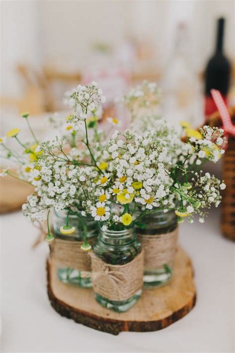 Because everything looks prettier in a mason jar. Mason jar wrapped with twine wedding centerpiece filled in ...