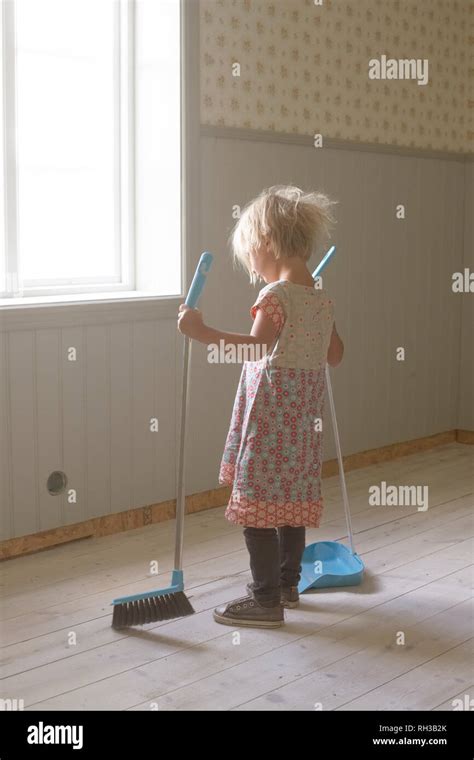Girl Sweeping Hi Res Stock Photography And Images Alamy