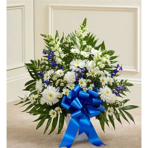 Sending flowers for a funeral can be an awful burden. Deepest Condolences Blue and White Flowers to Philippines ...