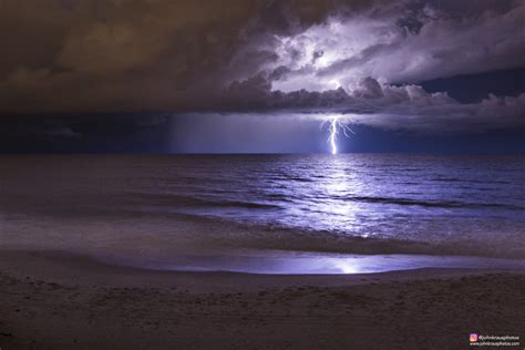Minden Nap Más Striking The Sea Lightning Off The Shore Of Satellite