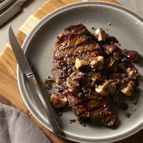 Rib eye is one of my favorite steaks to cook and eat. Grilled Rib Eye with Mushroom-Cabernet Sauce | Williams Sonoma