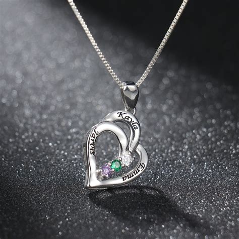 Emerald means green stone in greek which came from the word smaragdos. Overlapping Three Hearts Birthstone Necklace