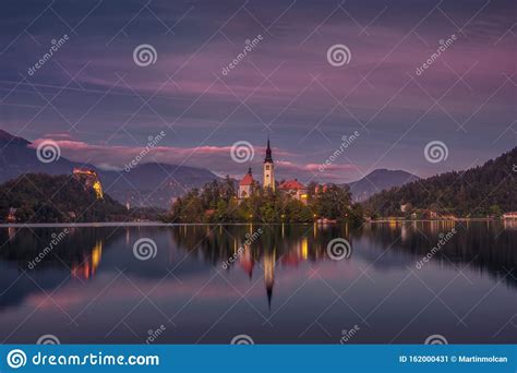 Colorful Sunset Landscape View Of Lake Bled Island And Church Slovenia