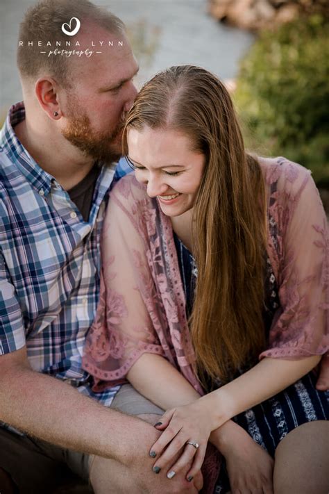 lindsey and kyse romantic engagement session on wausau riverwalk rheanna lynn photography