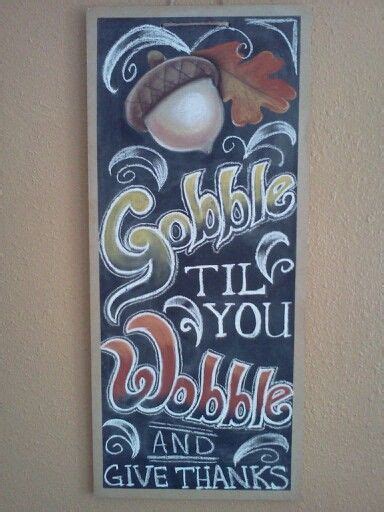 a chalkboard sign that says gobble til you bubble and give thanks to someone