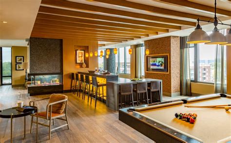 Here Is A Welcoming Clubroom That Allows Access To A Pooltable And