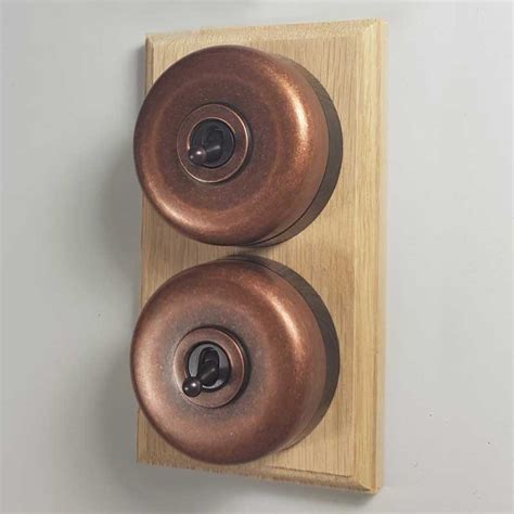 Round Dolly Light Switch On Wooden Base Antique Coppered 2 Gang
