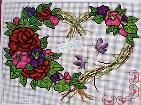 A Cross Stitch Pattern With Roses And Butterflies On The Front In
