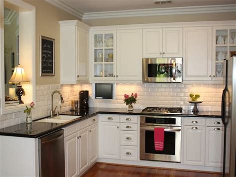 As a top, the marble countertop with golden handles. 23 Backsplash Ideas White Cabinets Dark Countertops