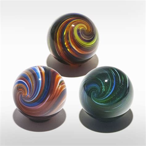 Set Of Three Onion Skin Marbles By Michael Trimpol And Monique